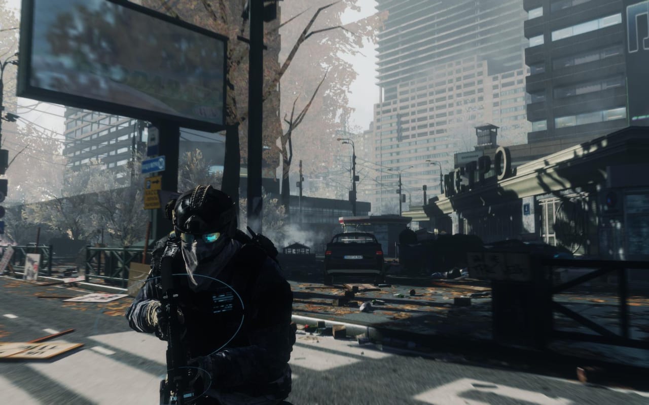 Ghost operator with a glowing visor sweeping a ruined city street beside a metro station in Ghost Recon Future Soldier